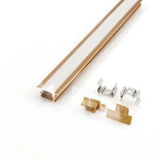 Two lengths of brushed gold LED channel with white diffusers, shown beside their gold end caps and mounting clips