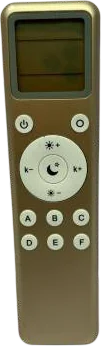 A slim champagne-gold remote handset with an LCD panel at the top above a circular navigation pad and a grid of buttons
